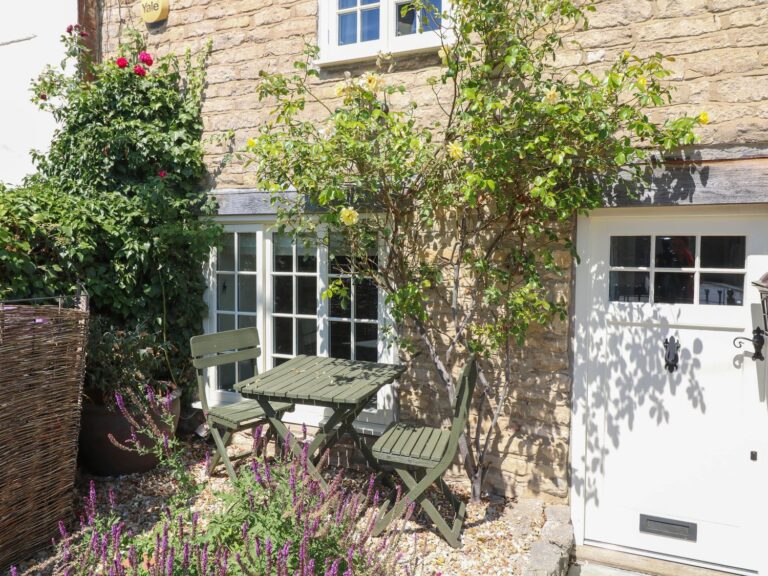 The cottage door and herb garden